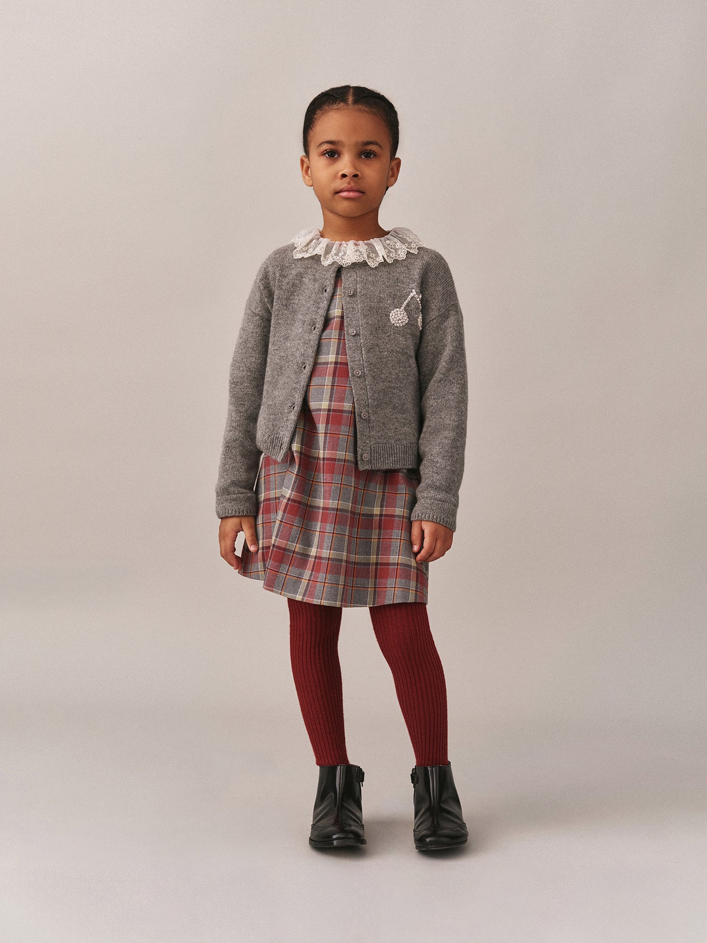 Look de niña invierno 2025 - Vestido de cuadros