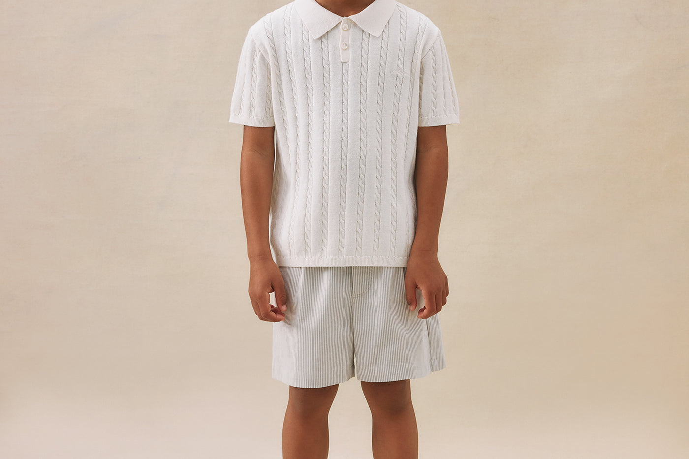 Look de niño verano 2025 Polo de punto trenzado