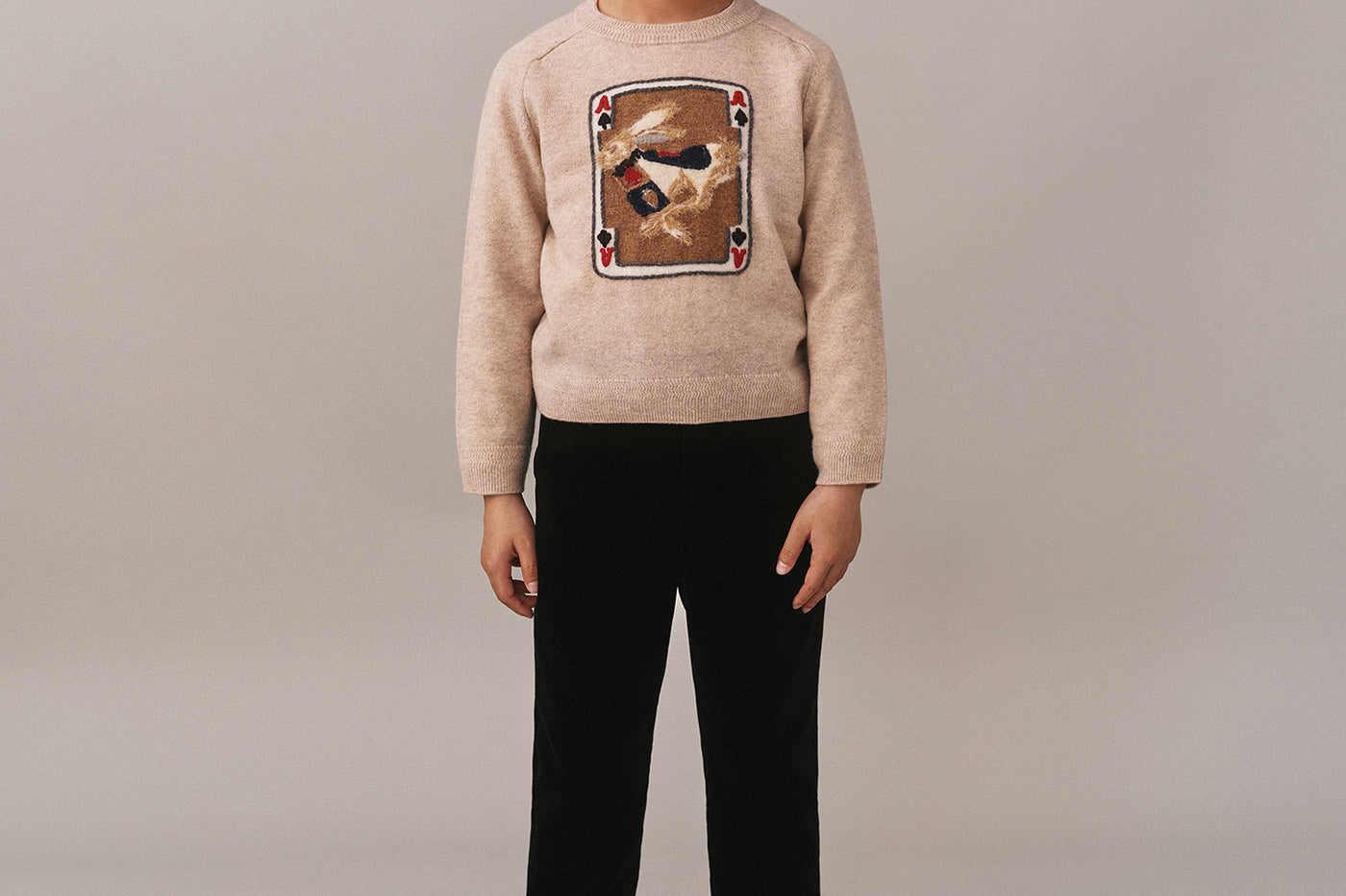 Look de niño invierno 2025 - Jersey beige con conejo