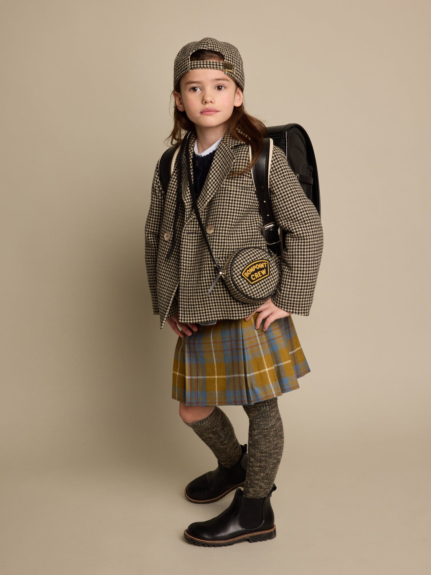 Invierno 2023 look con blazer de niña