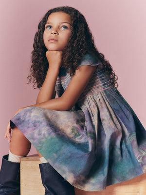 Bonpoint x MoMA Kleid Duchesse gesmokt und handbestickt aus Bio-Baumwolle