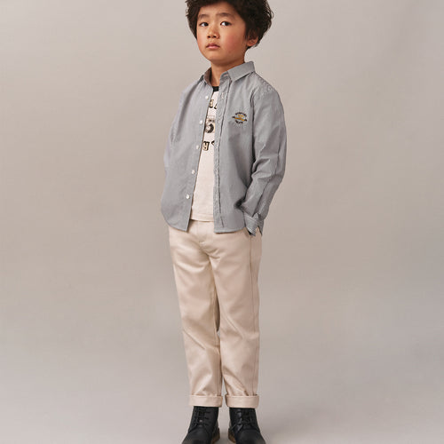 Camicia Tangui a righe con colletto a punta e ricamo sul petto