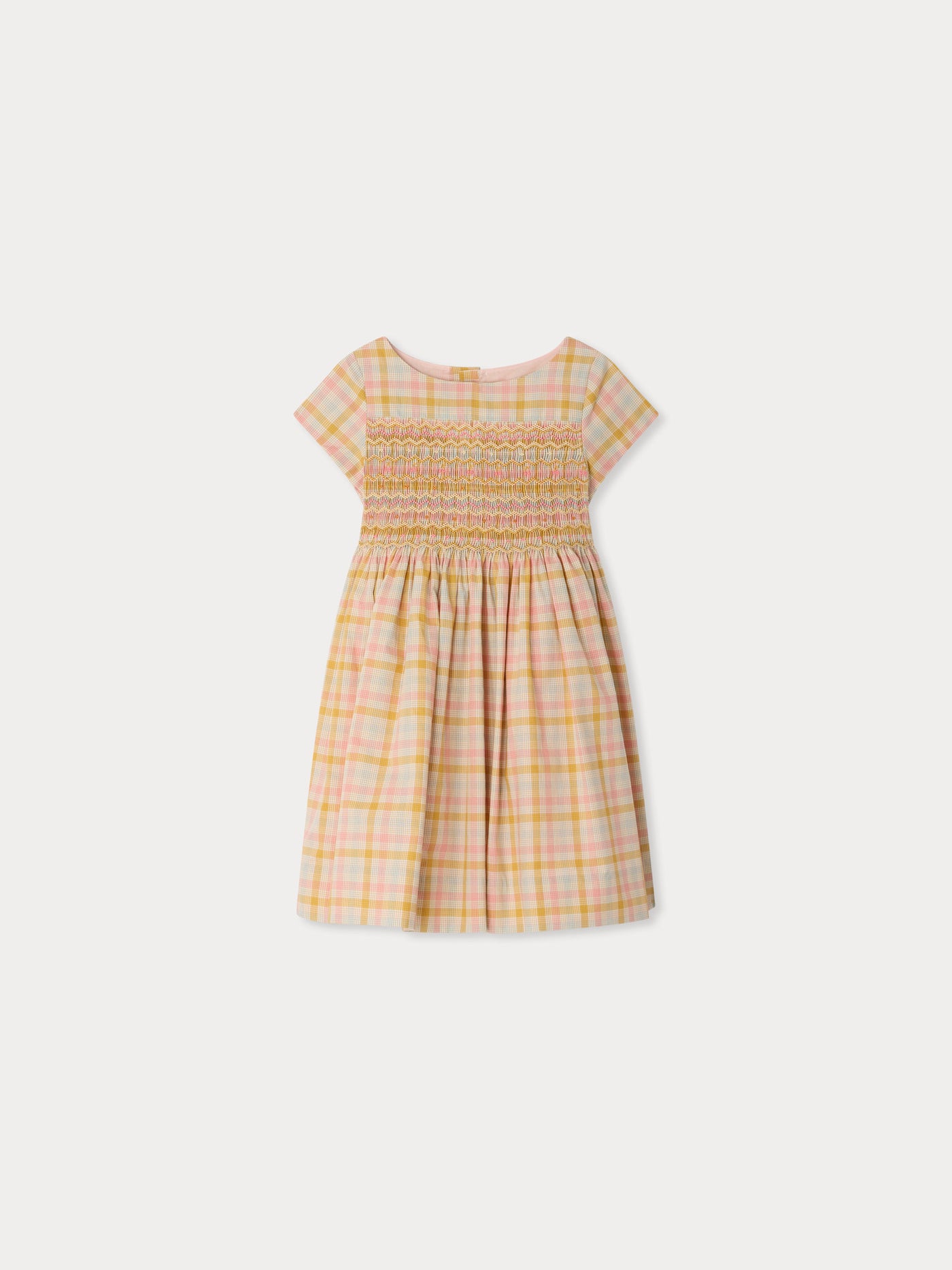 Duchesse dress in a smocked hand-embroidered check pattern in organic cotton