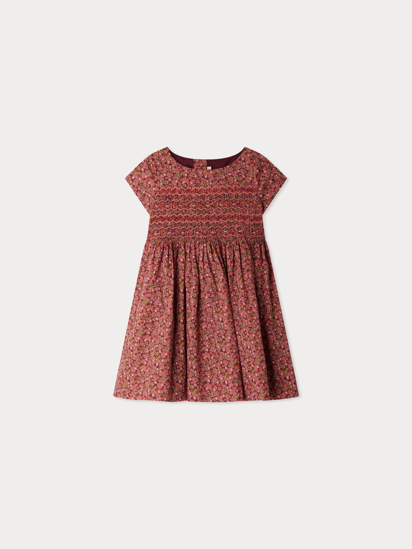 Smocked and embroidered Duchess dress in Liberty fabric in organic cotton
