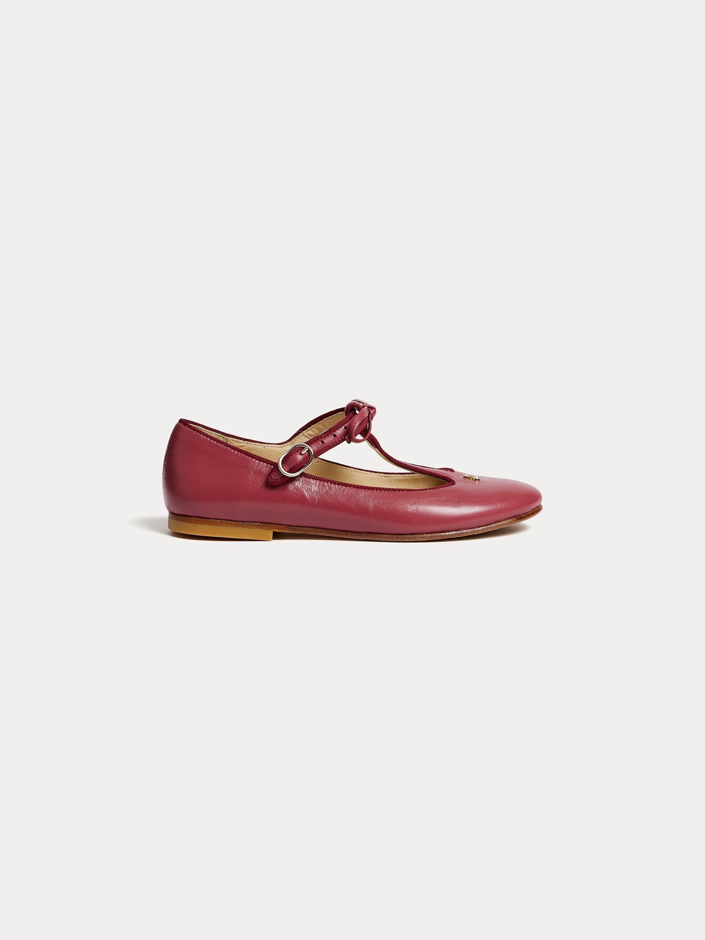Joyce salomés in burgundy and cherry gold leather