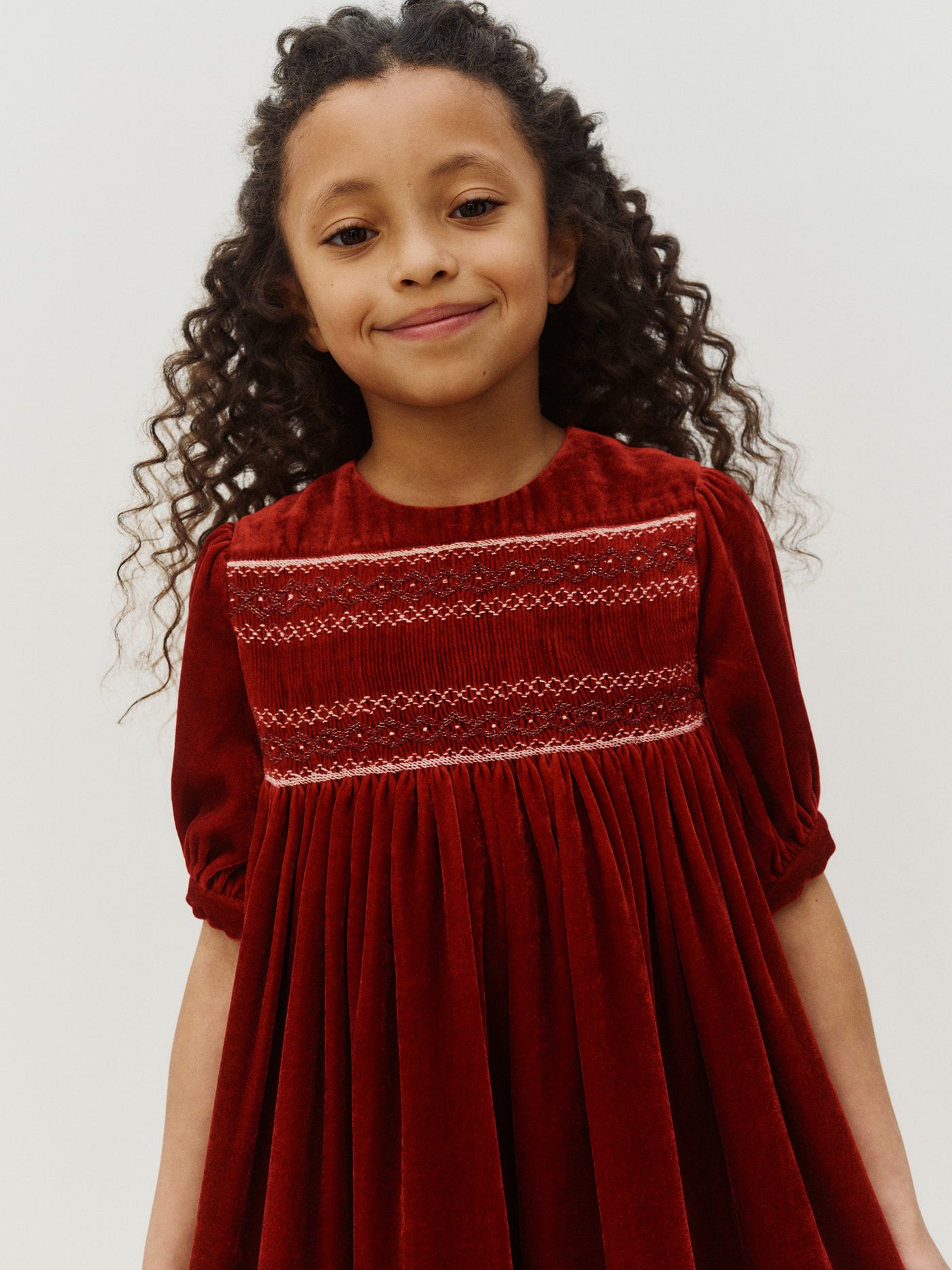 Mélodine smocked and hand-embroidered silk velvet dress