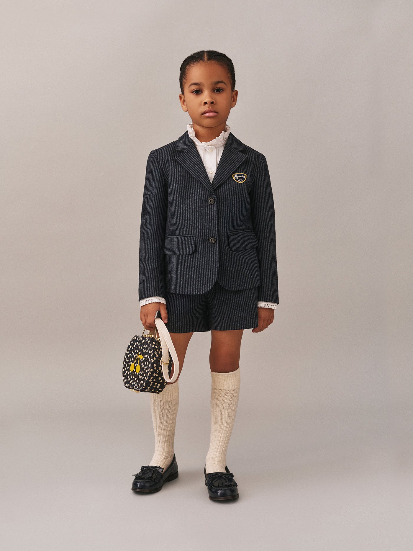 Look invernale per bambina 2025 - Completo a righe