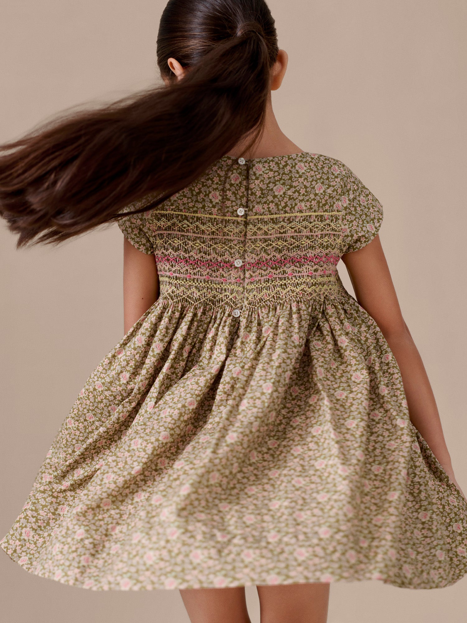 Duchesse dress smocked and hand-embroidered in Liberty organic