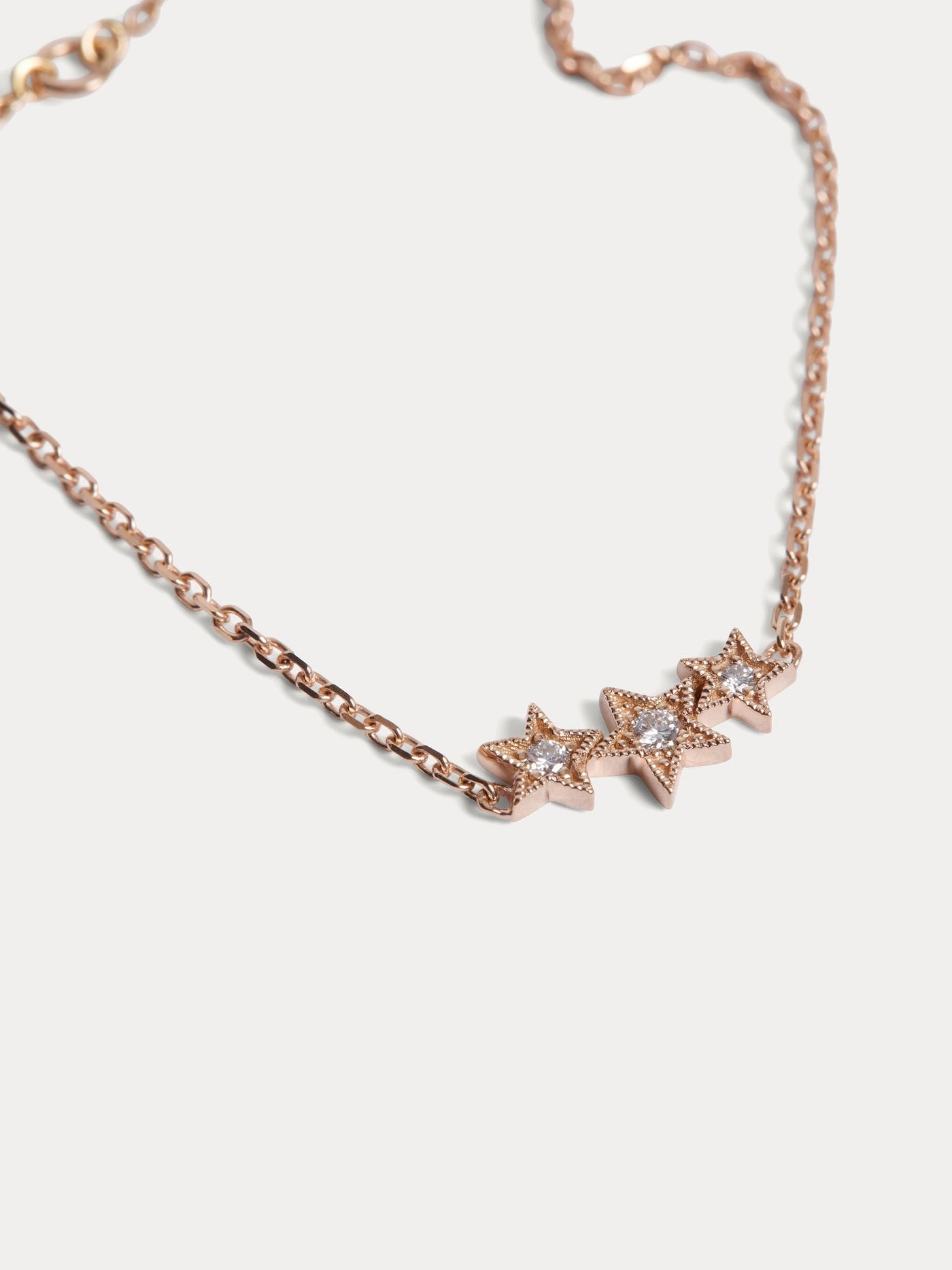 Bracelet enfant trois étoiles or rose