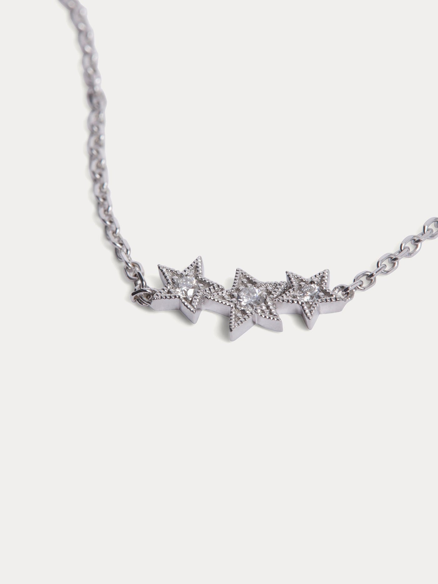 Braccialetto bambino tre stelle oro bianco