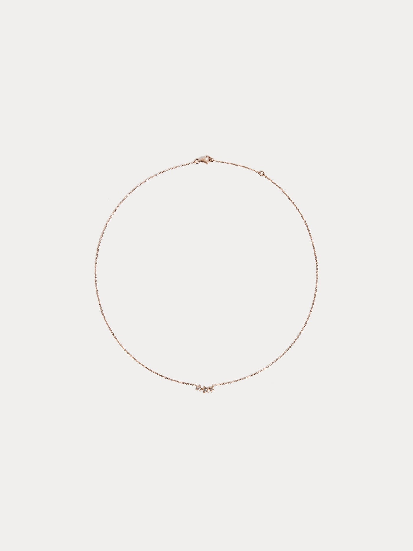 Collier enfant trois étoiles or rose