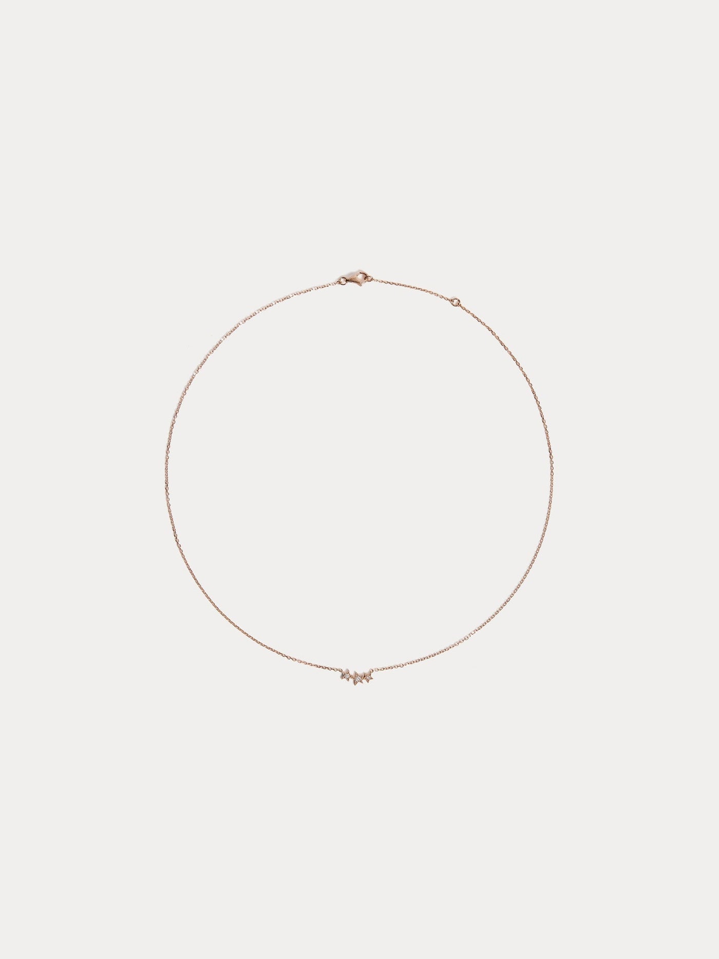 Collier enfant trois étoiles or rose