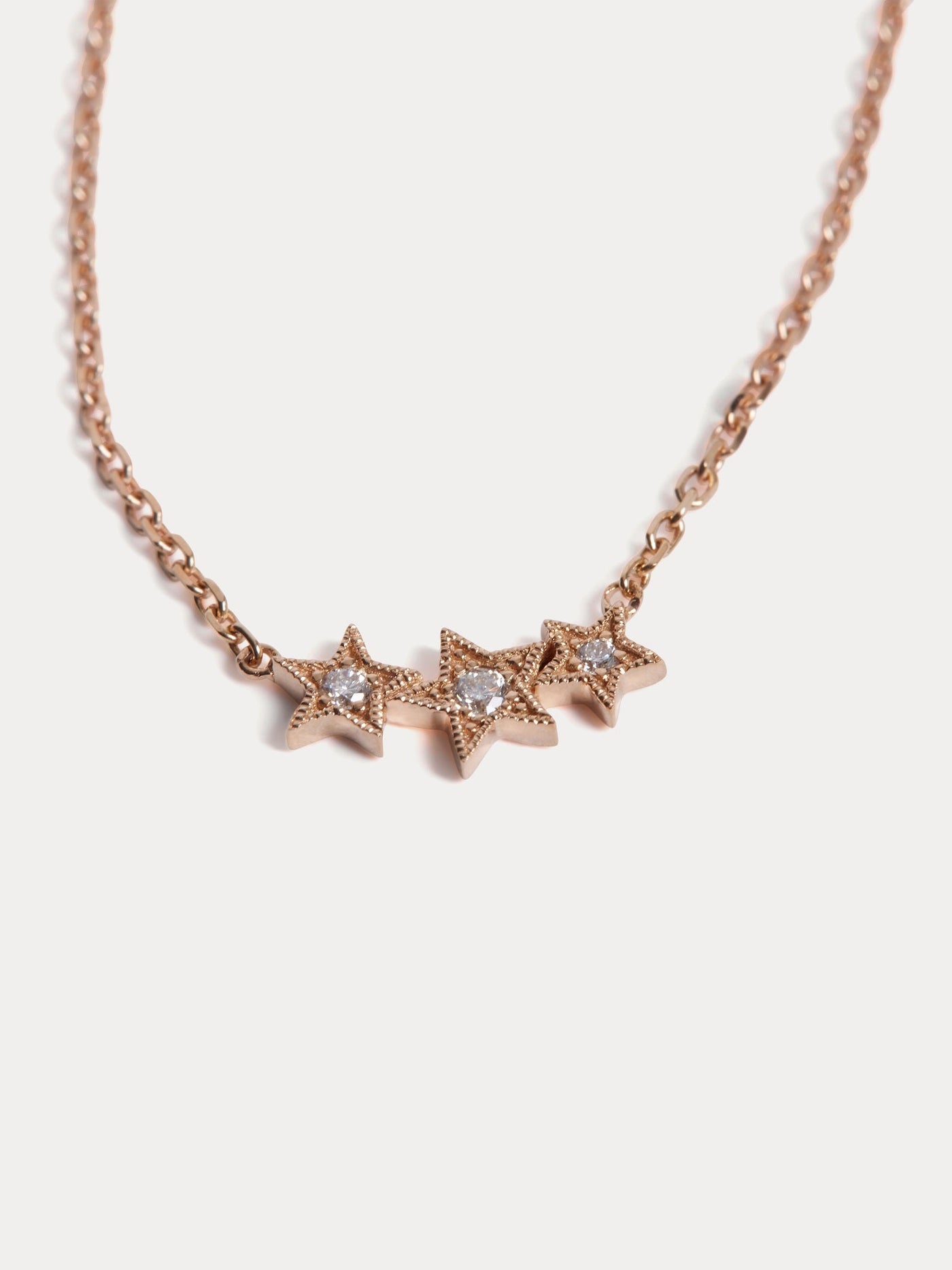 Collier enfant trois étoiles or rose