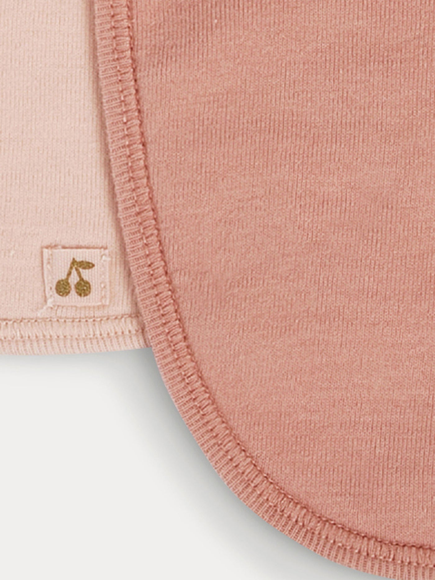 Set di tre bavaglini in cotone per neonato colore rosa pallido