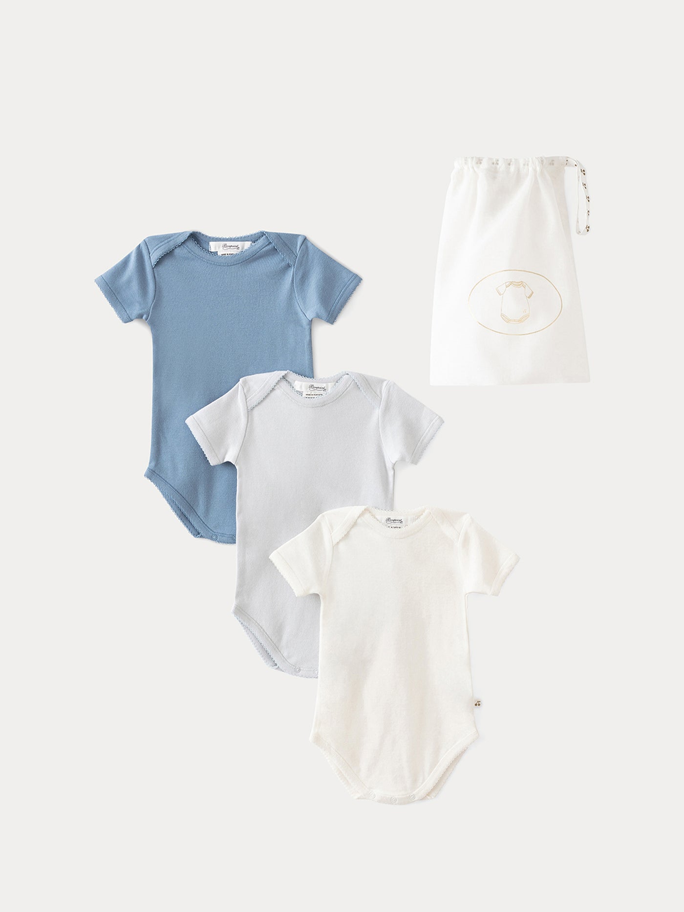 Set di tre tutine per neonato in cotone biologico azzurro cielo