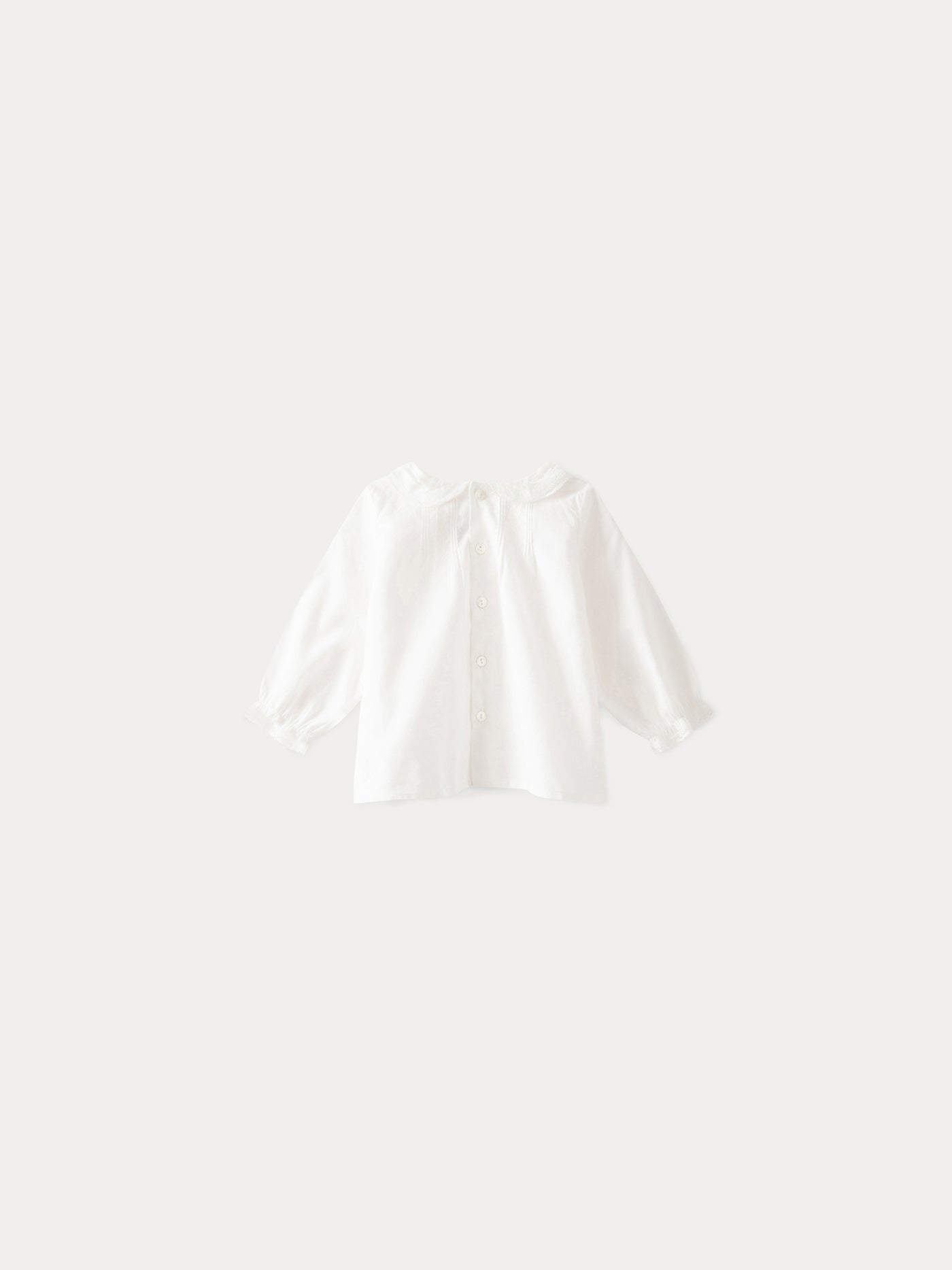 Blusa neonato in voile di cotone bianco latte