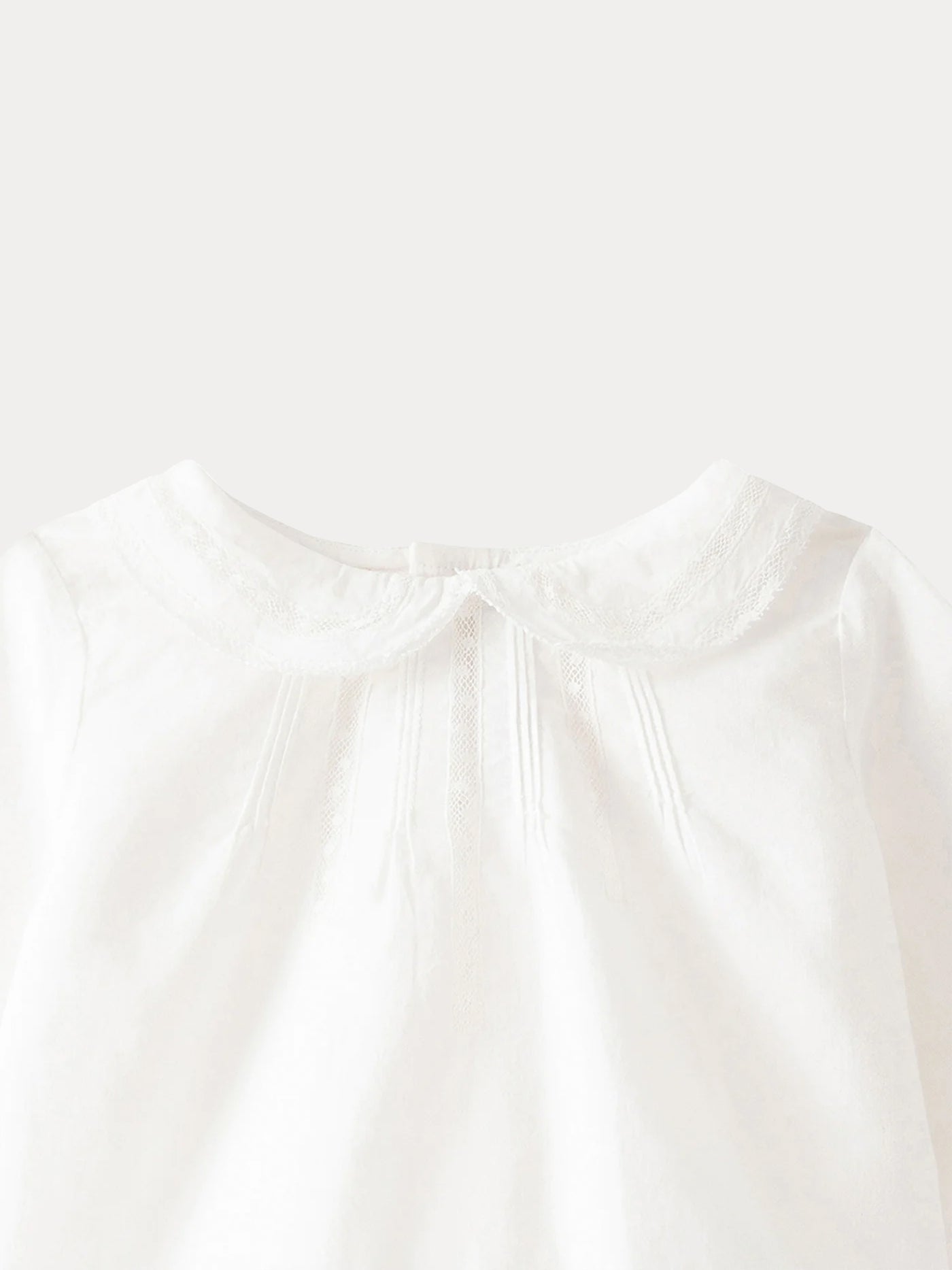 Blusa neonato in voile di cotone bianco latte