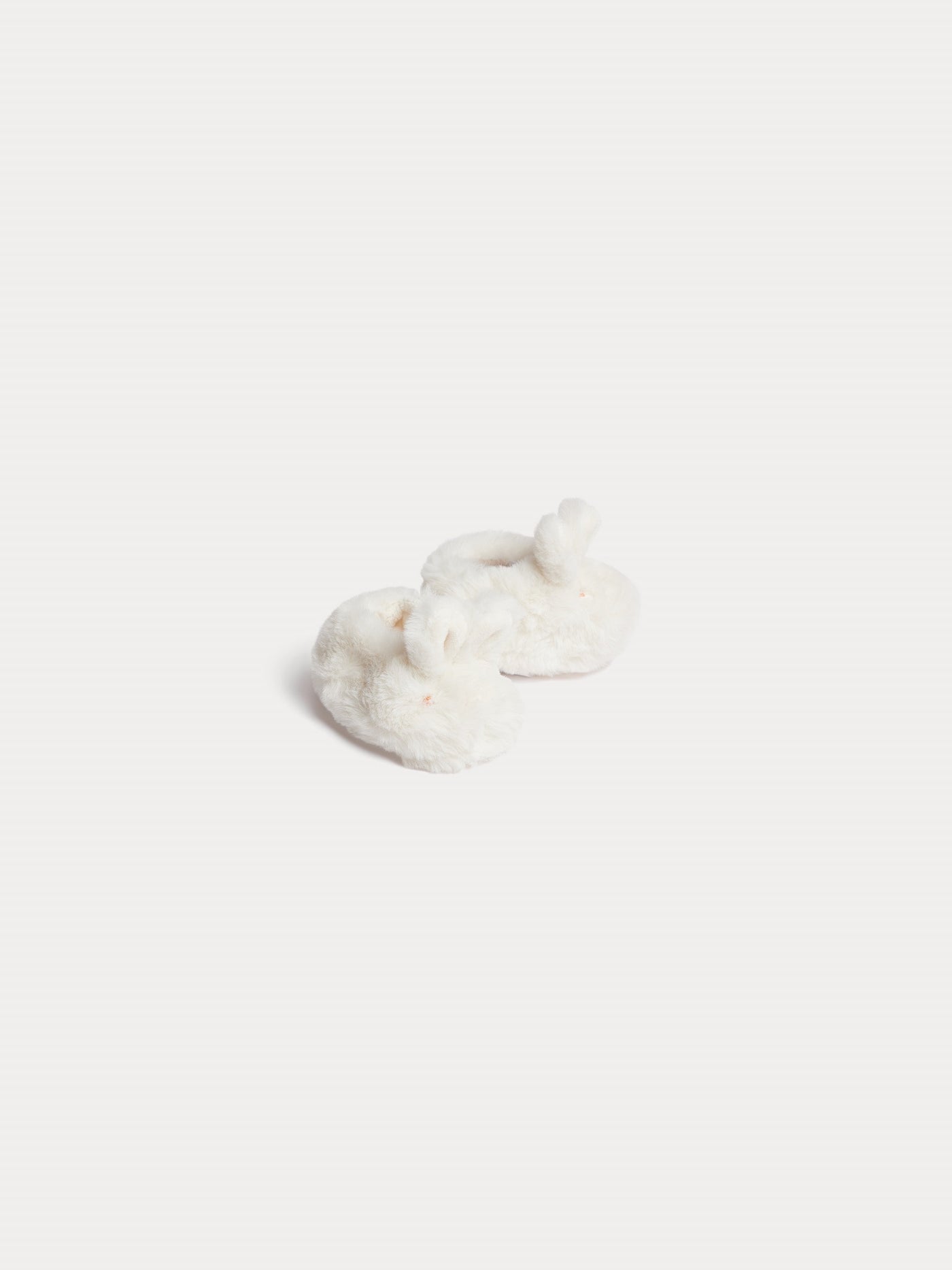 Milchweiße Babyschuhe