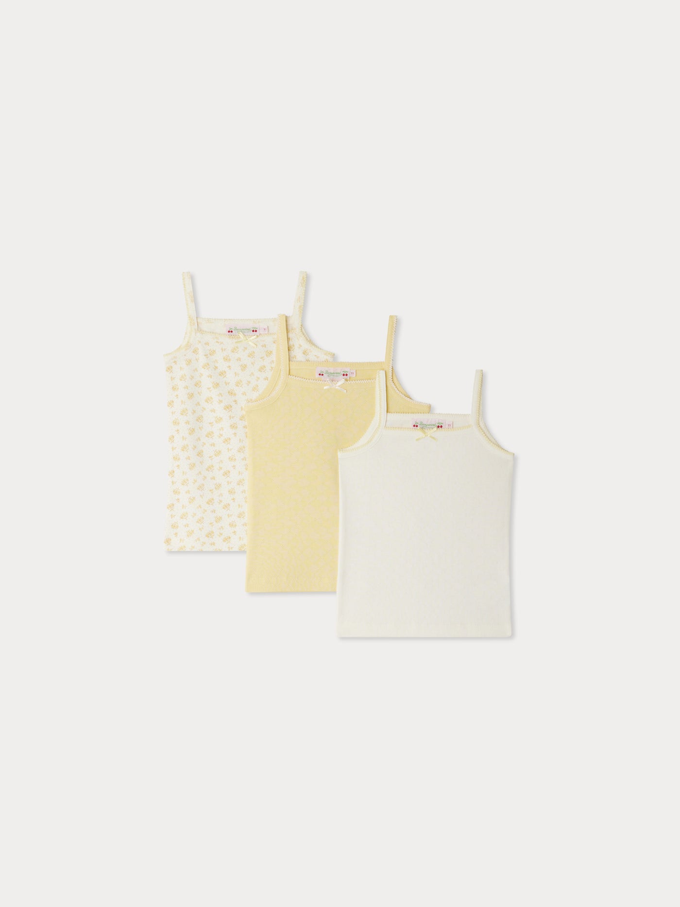 Top in anice con fiocchi gialli