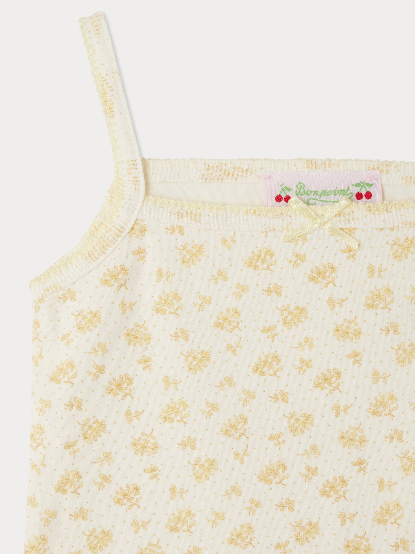 Top in anice con fiocchi gialli