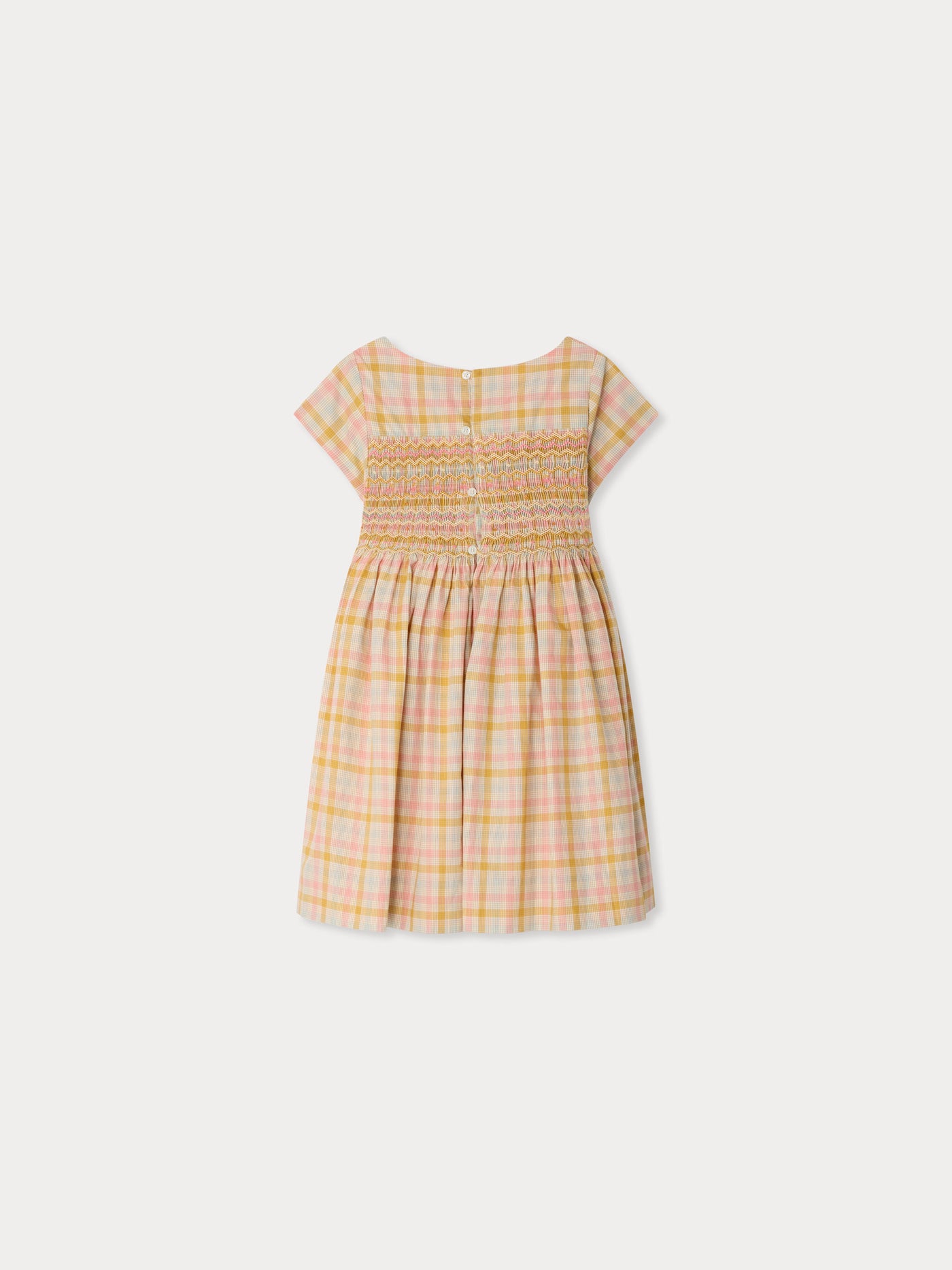 Duchesse dress in a smocked hand-embroidered check pattern in organic cotton