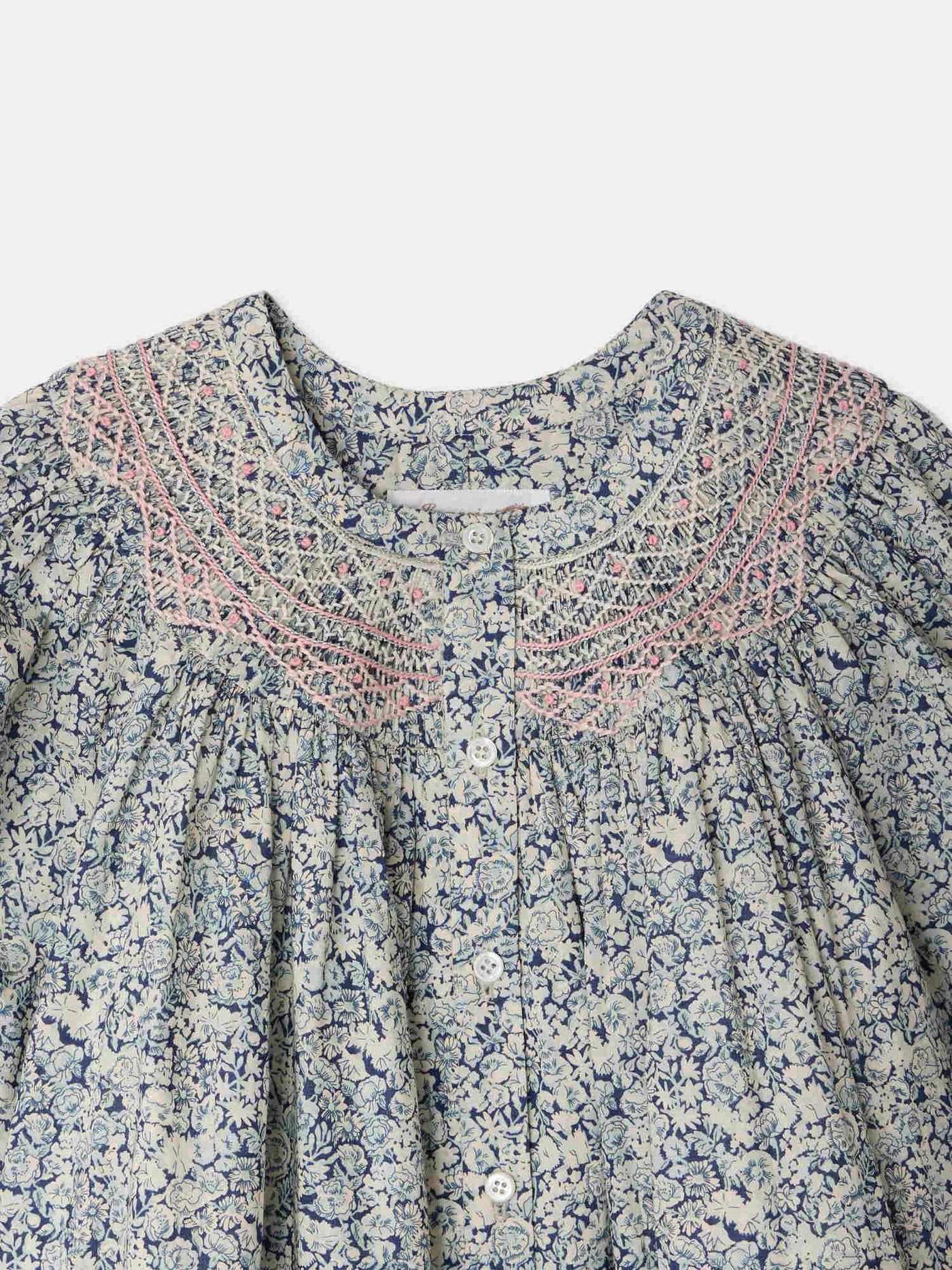 Ladwiga smocked and hand-embroidered dress in Liberty organic cotton fabric