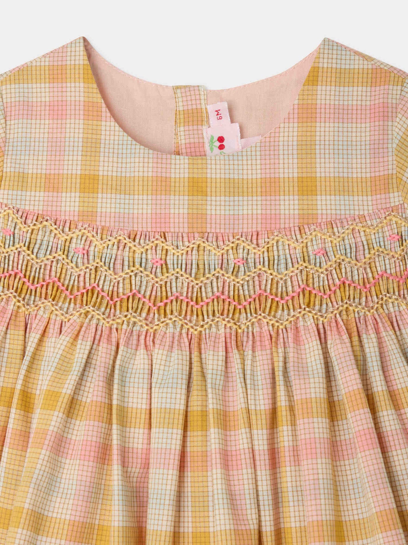 Robe Marushka smockée et brodée main en coton biologique