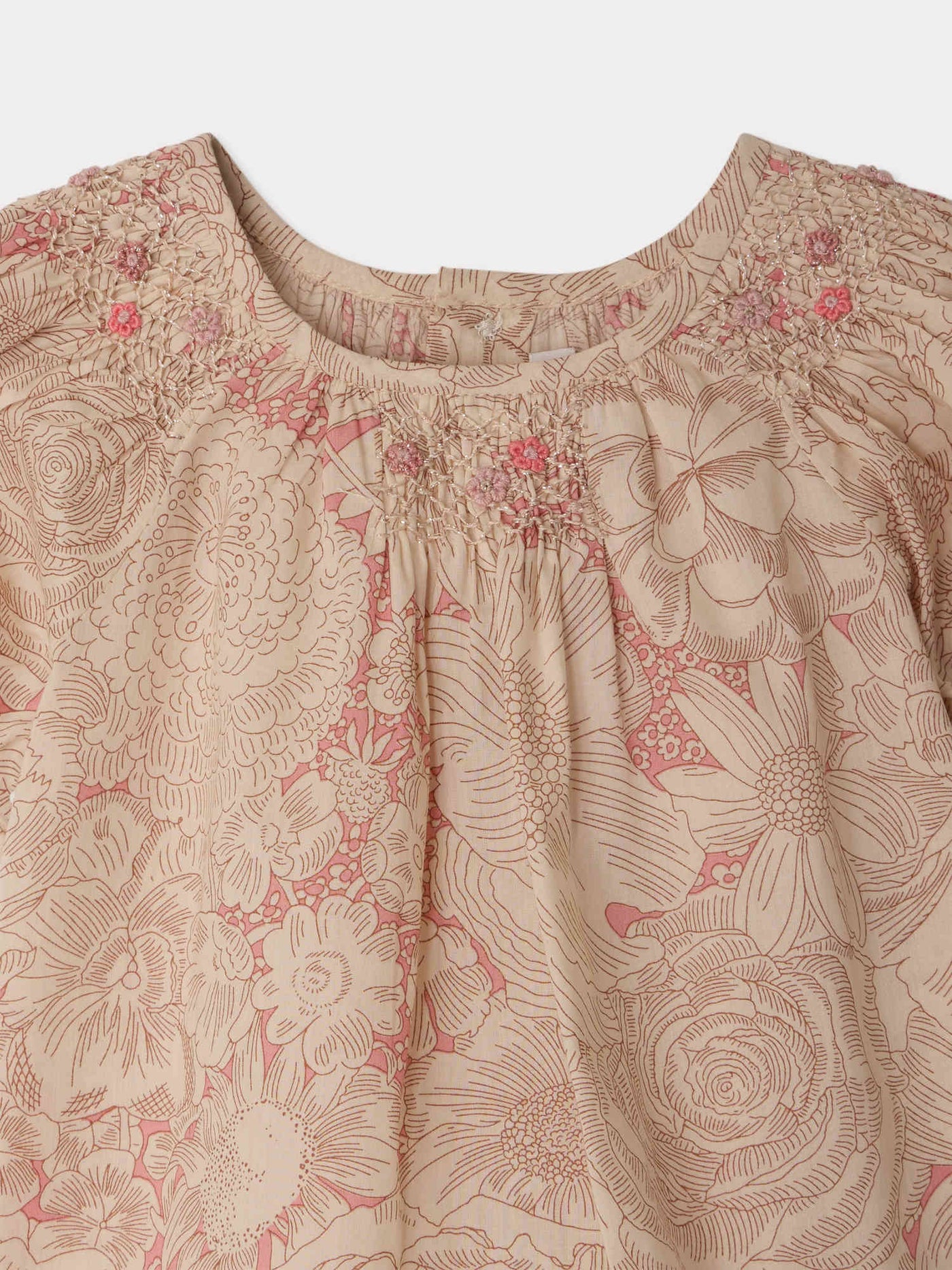 Lucia-Kleid gesmokt und handbestickt aus Bio-Baumwollstoff von Liberty