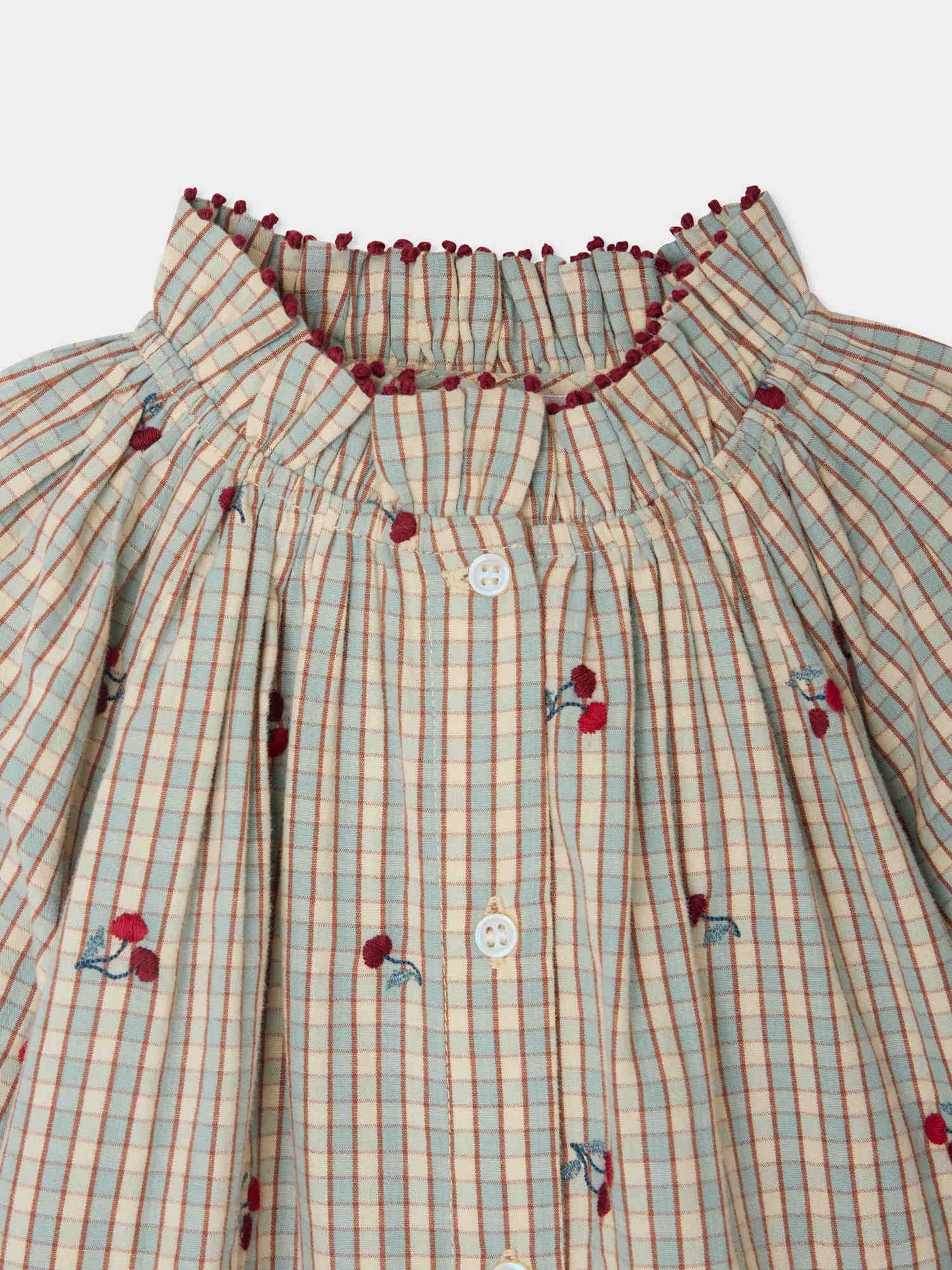 Blusa Jordana con volant in cotone biologico e ricamo di ciliegie
