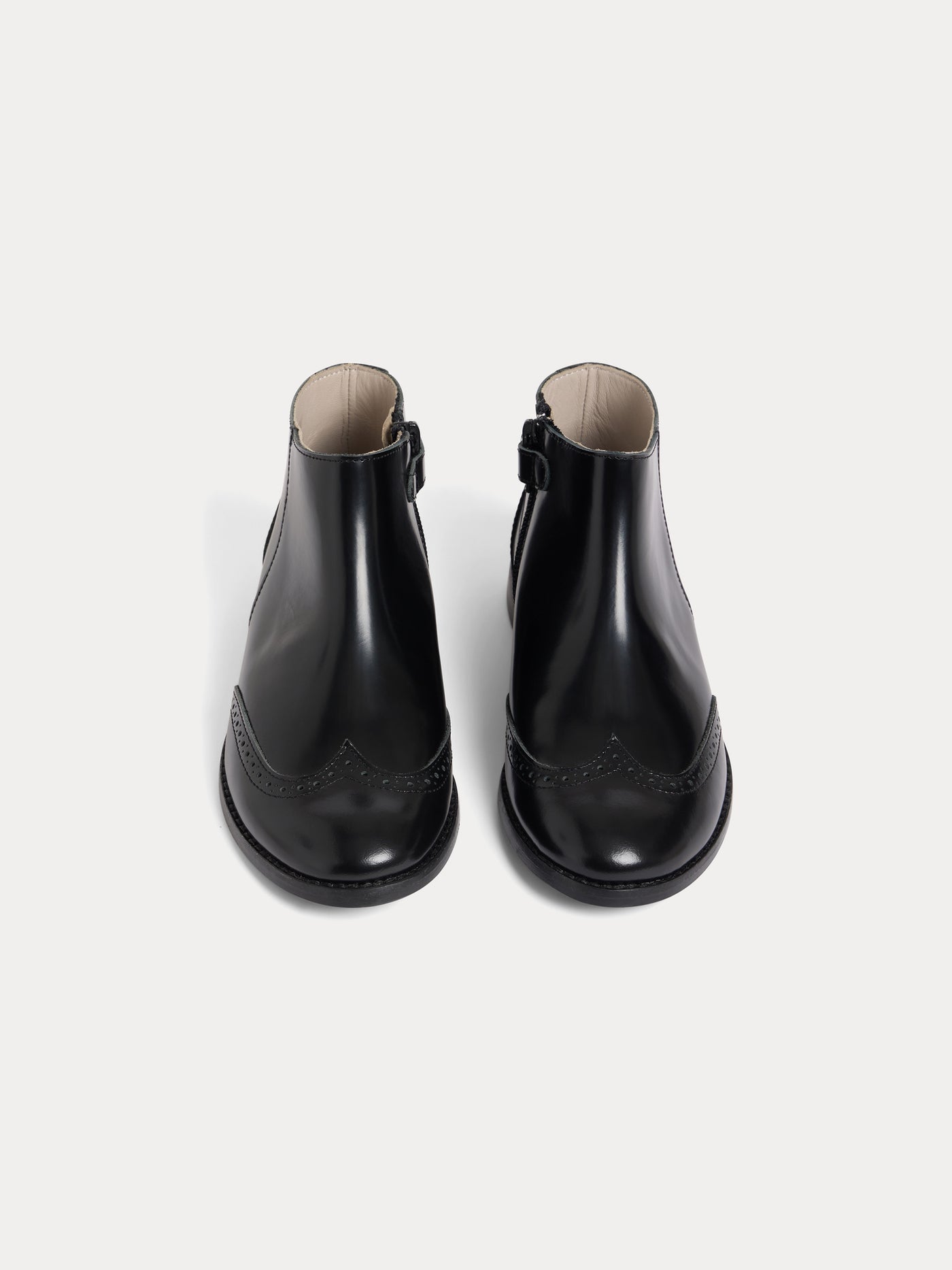 Bottines Janette zippées en cuir à bout fleuri