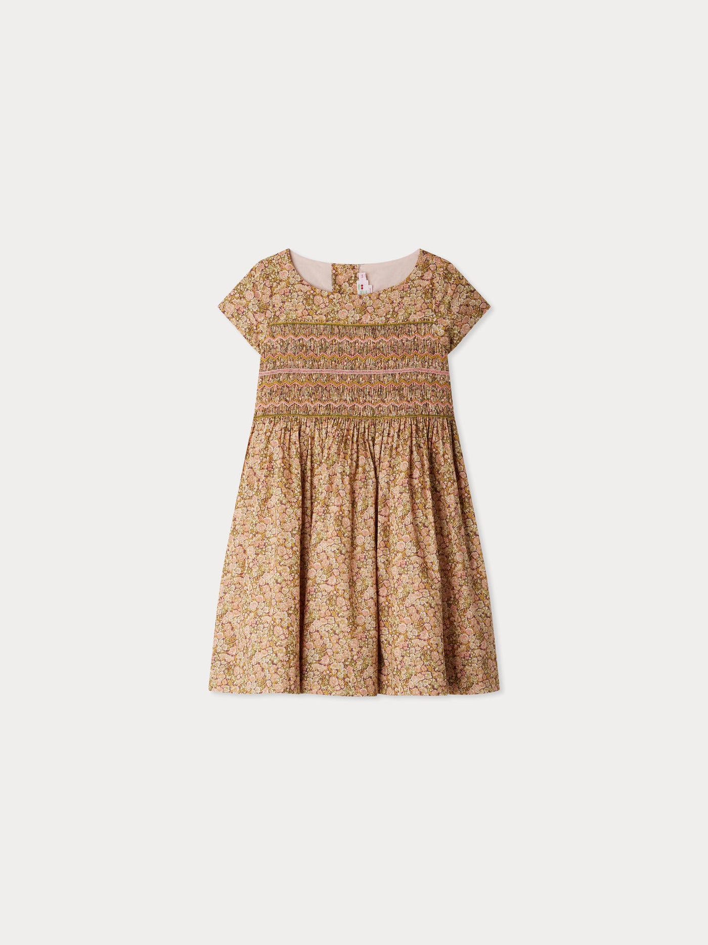 Smocked and embroidered Duchess dress in Liberty fabric in organic cotton