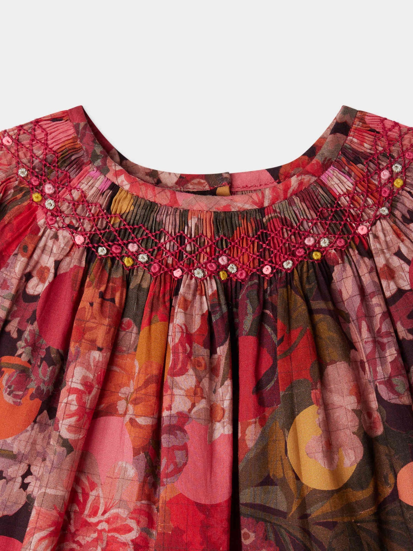 Griottine smocked and embroidered dress in Liberty fabric in organic cotton