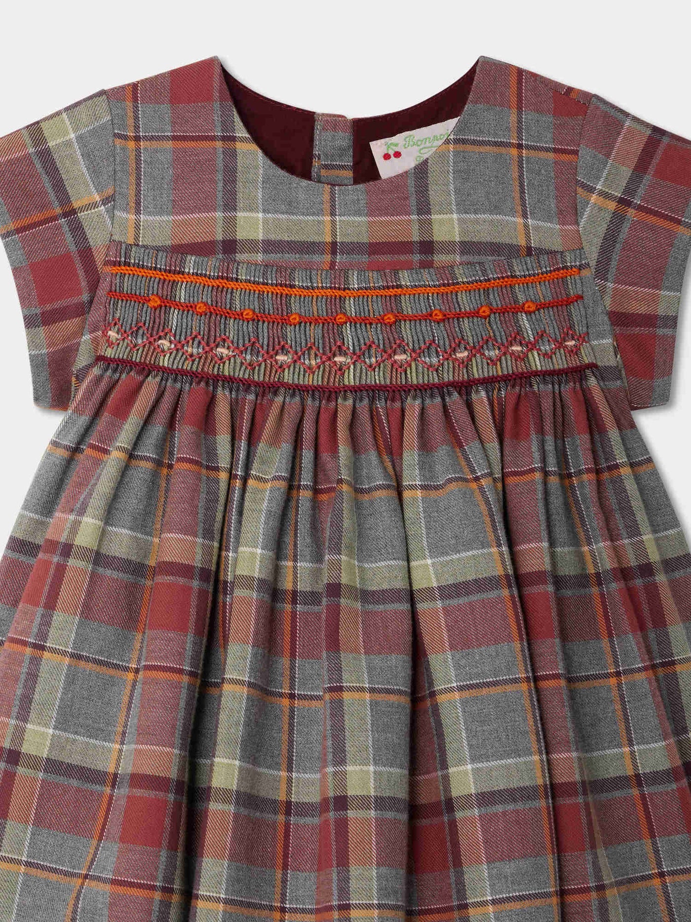 Robe Marushka smockée et brodée à carreaux bordeaux