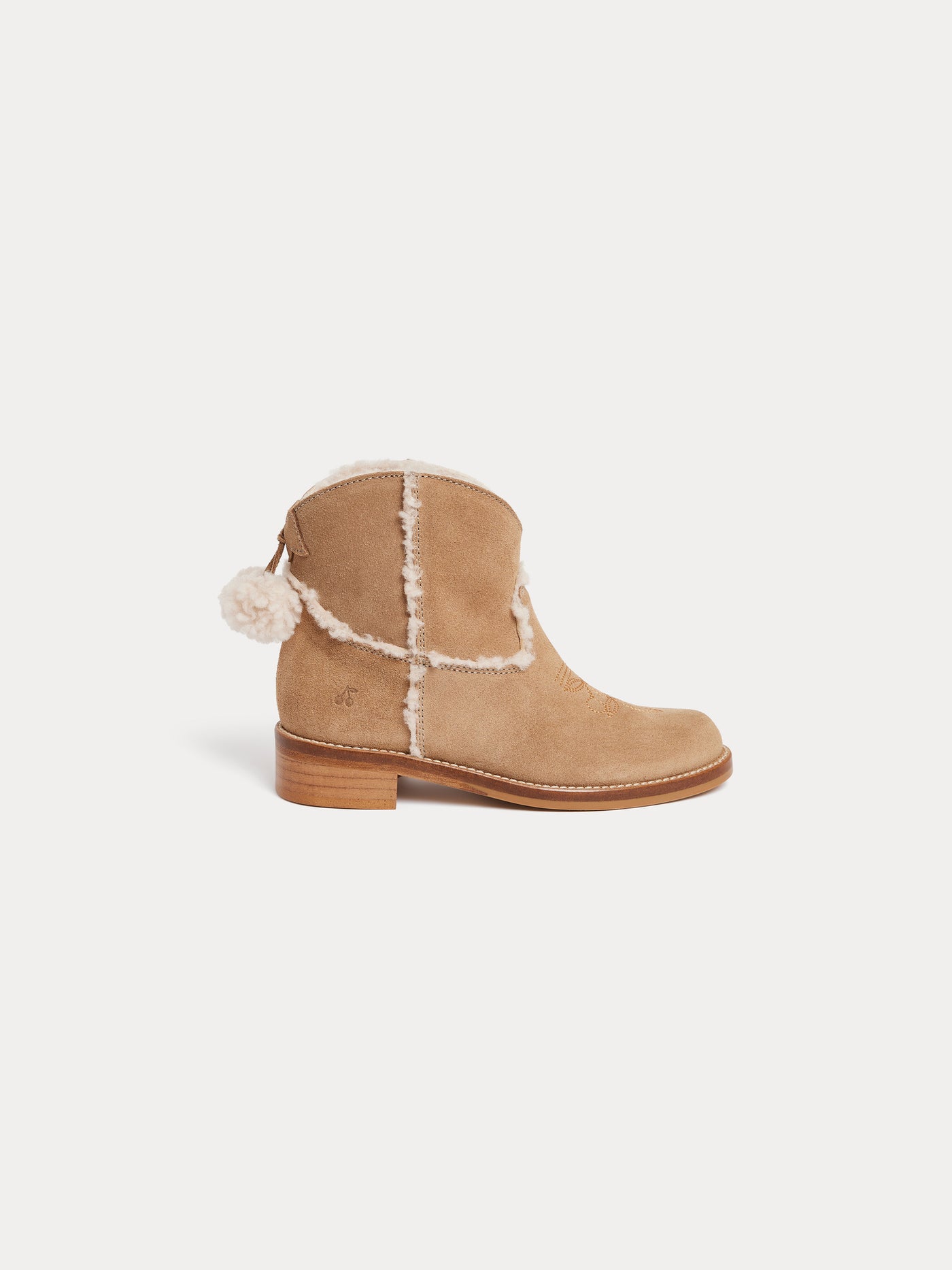 Maysha western boots in leather and faux fur