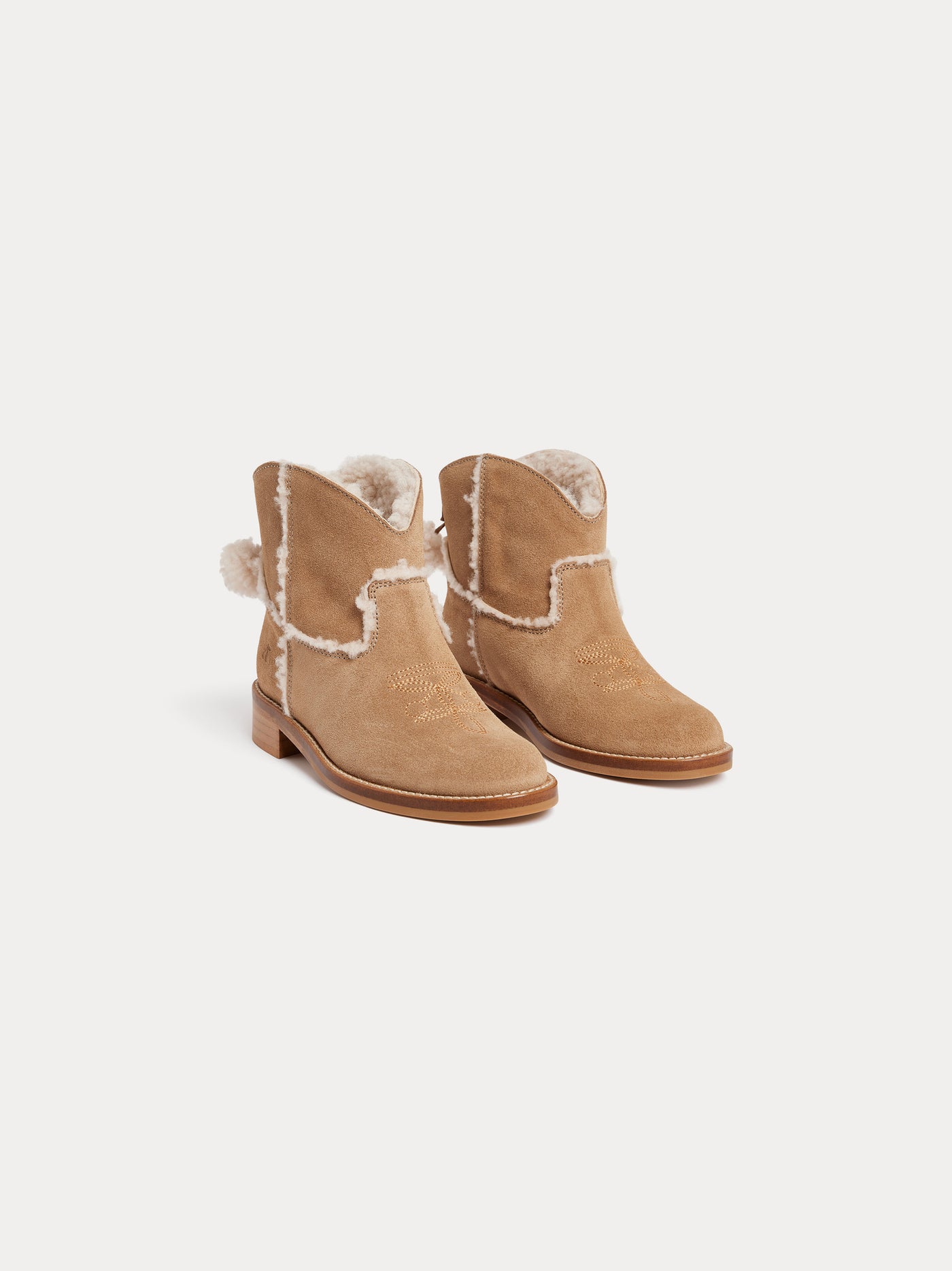 Maysha western boots in leather and faux fur