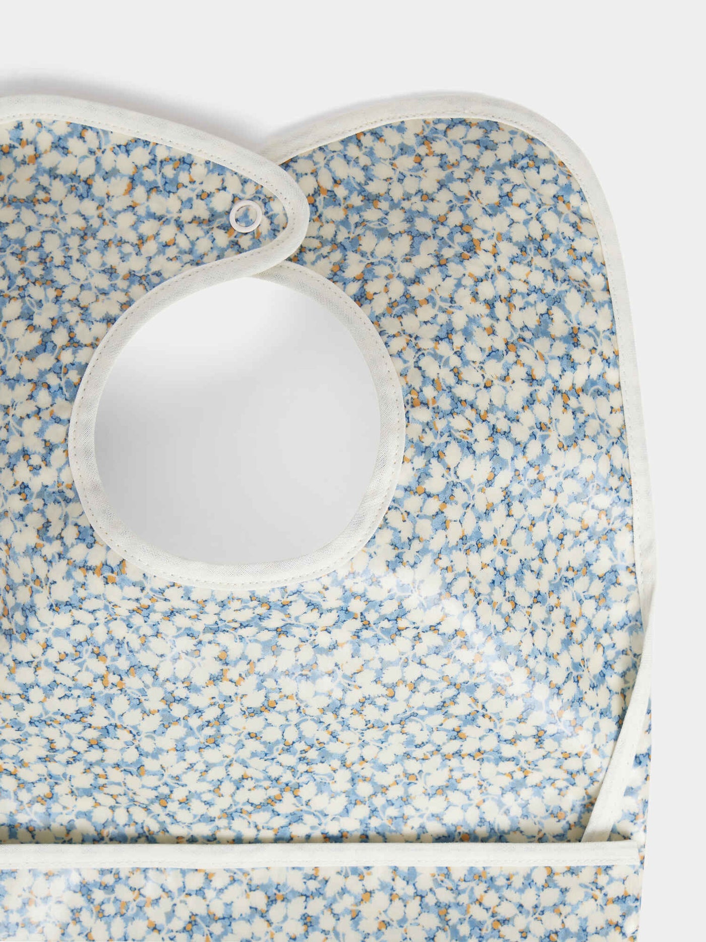 Bavoir clip en tissu Liberty bleu en coton enduit biologique