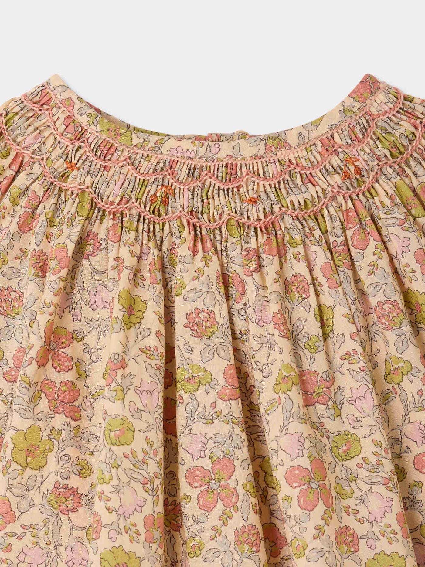 Blouse bébé Griotte en tissu Liberty smockée et brodée main en coton biologique