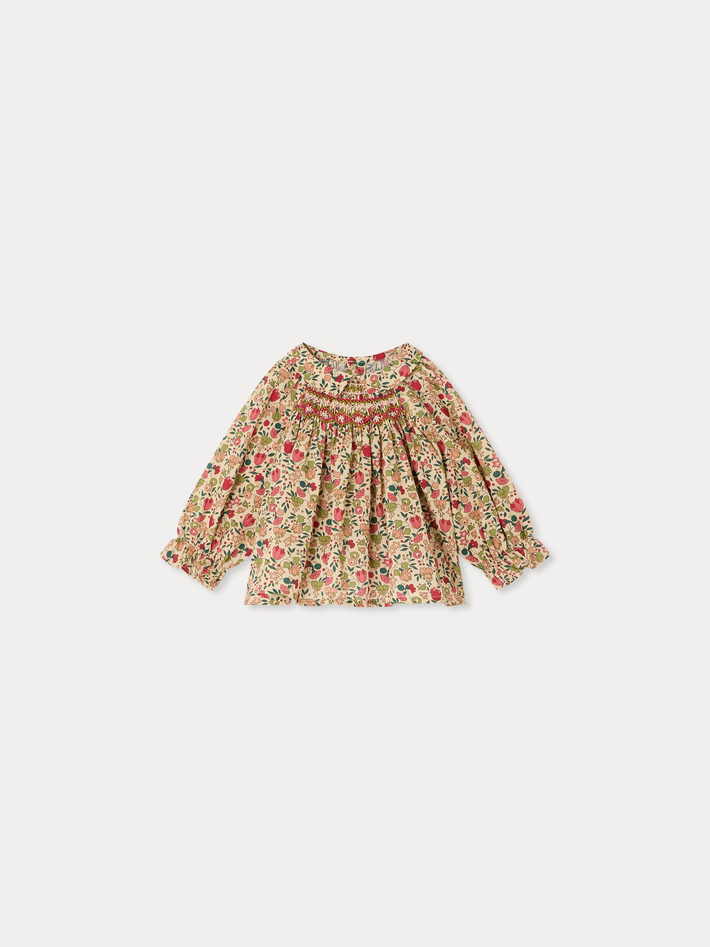 Pompom Baby-Bluse aus Liberty-Stoff, gesmokt und handbestickt, Bio-Baumwolle