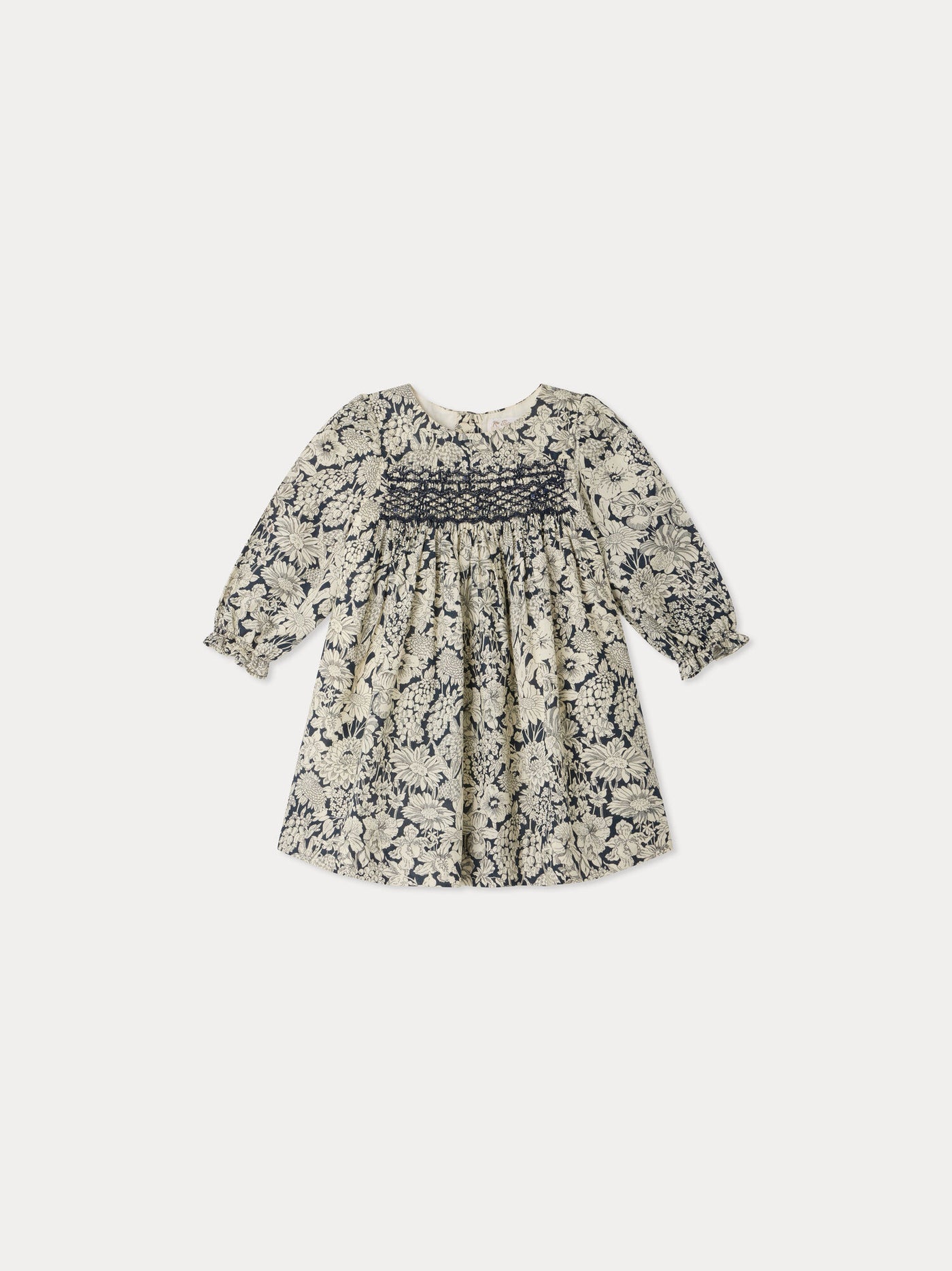 Abito neonato Jailys in tessuto Liberty con smock e ricamo a mano in cotone biologico